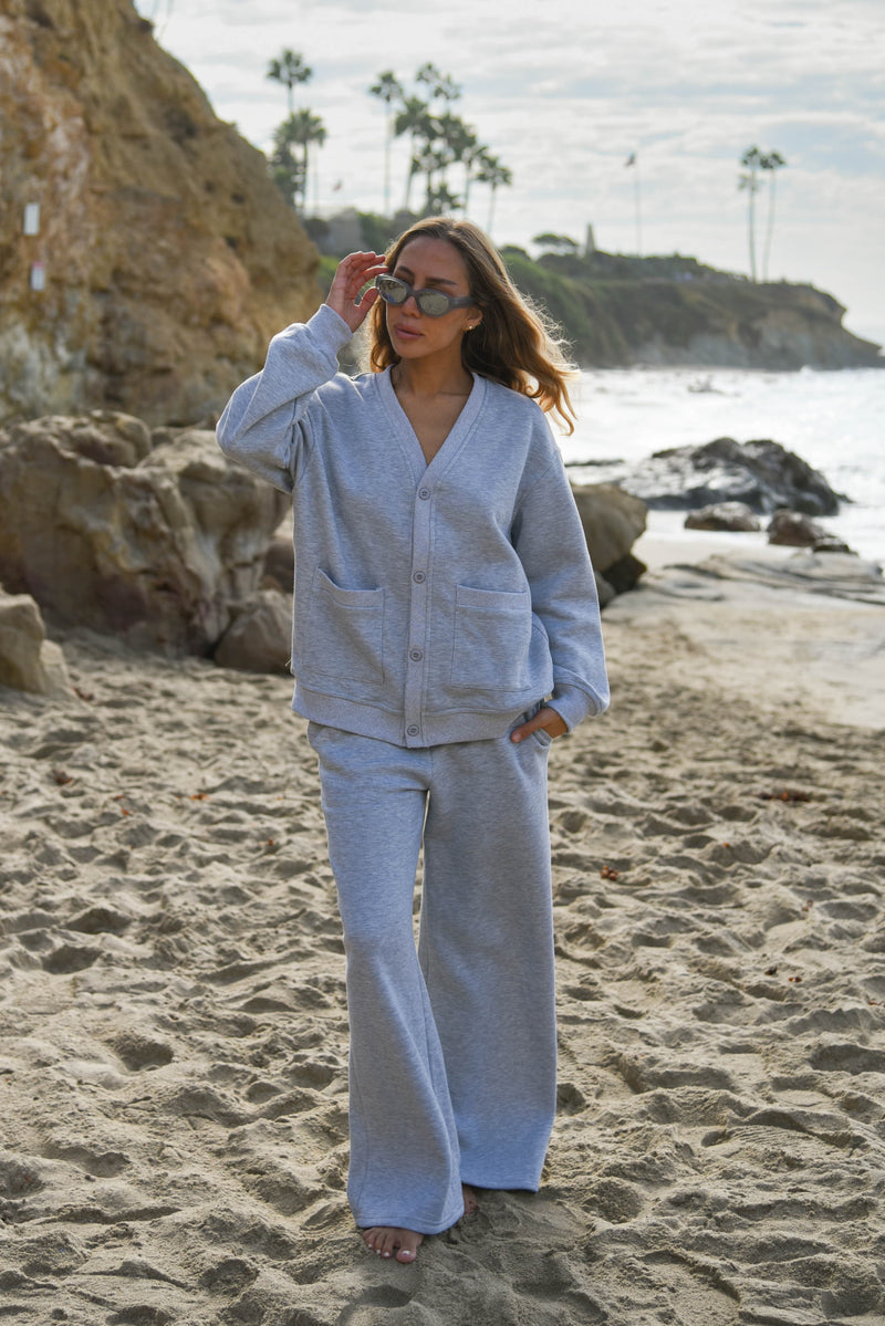 Woman in a gray sweat set for fall