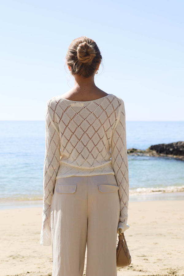 white crochet sweater