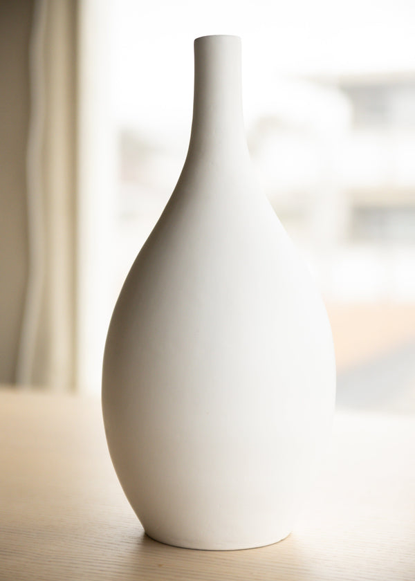 white ceramic minimal vase