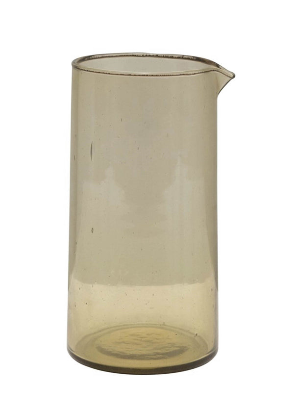 green glass water pitcher