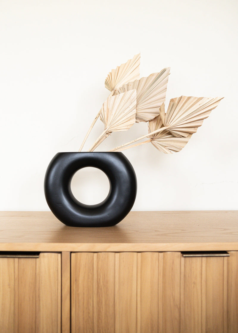 modern black circular vase